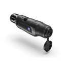 A black Zeiss monocular binocular with its protective cap removed and hanging below, shown on a clean white background with a soft shadow.